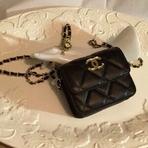 Sweet small Designer logo over the shoulder bag.